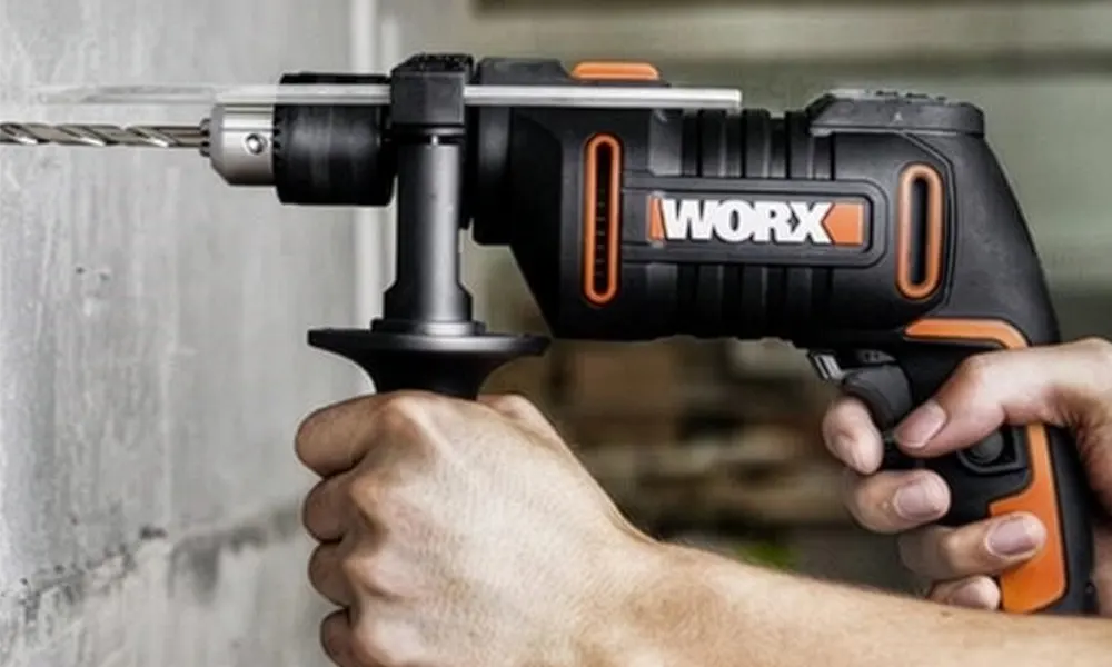 Placeholder for a hammer drill being used to drill into a brick wall
