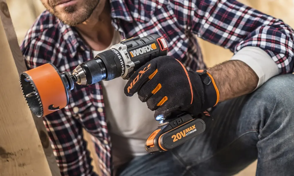 The WORX Slammer being used to drill into a masonry wall